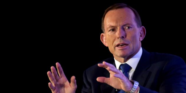 Former Australian Prime Minister Tony Abbott responds during a question and answer session after delivering a lecture at the Fullerton Hotel in Singapore on Wednesday, Dec. 9, 2015 (AP Photo/Joseph Nair)