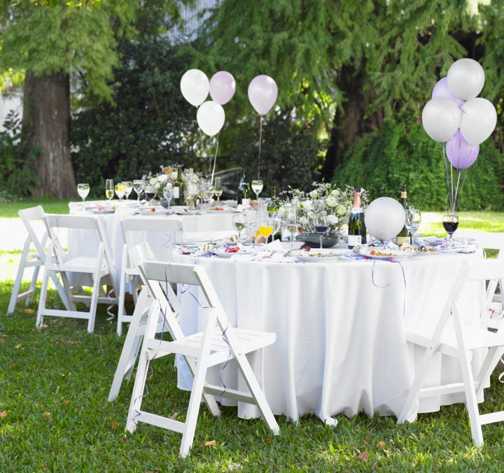 Consider hosting a garden party in your own yard to keep costs low.