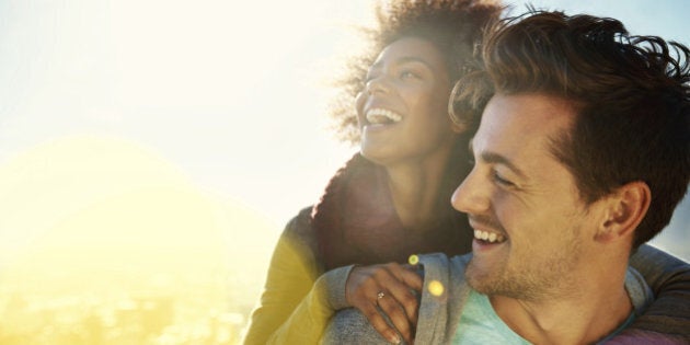 Shot of a young couple spending time together in the outdoors