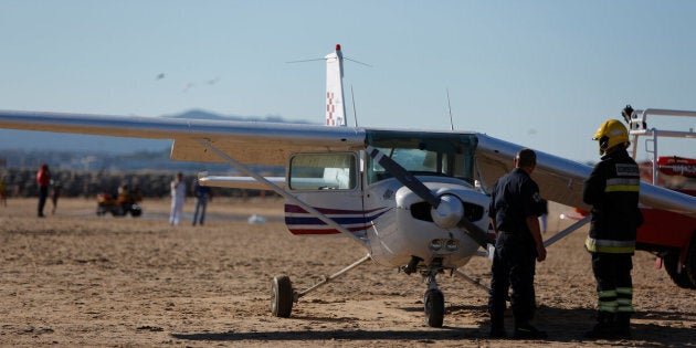 A plane landed in Sao Joao Beach, killing two people, in Costa da Caparica, Portugal August 2, 2017. REUTERS/Pedro Nunes