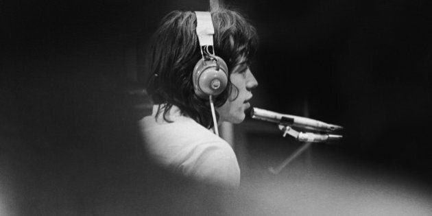 Mick Jagger of The Rolling Stones in a London recording studio during the filming of French film director Jean-Luc Godard's 'Sympathy For the Devil' (aka 'One Plus One'), 30th July 1968. (Photo by Keystone Features/Hulton Archive/Getty Images)