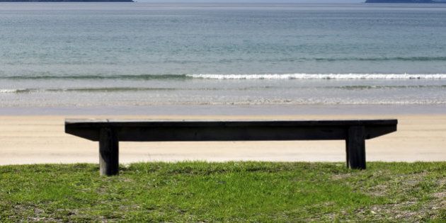 Empty outdoor bench on the sea