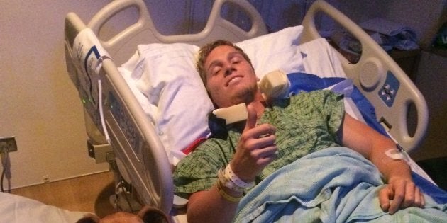 The 25-year-old's operation on his spine was a success, but he still has no movement from his chest down.