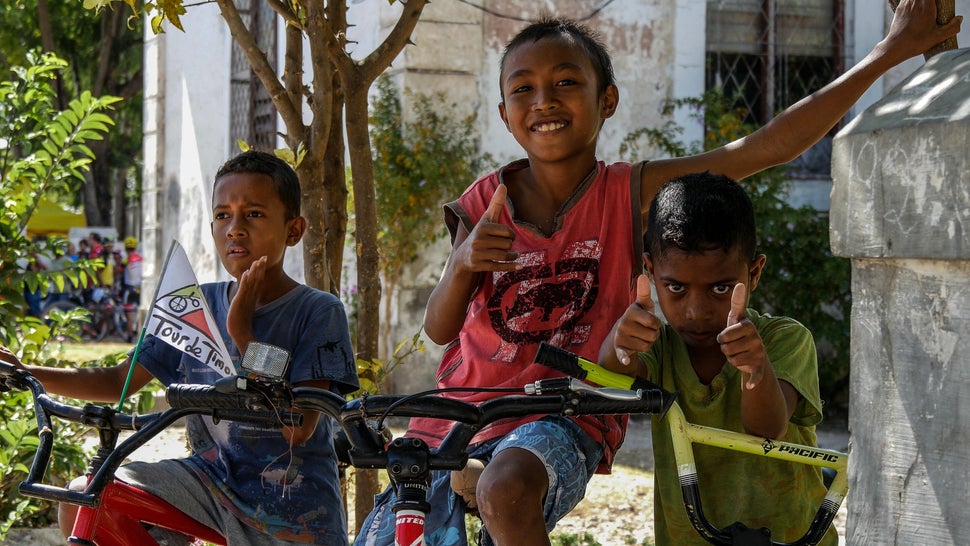 These young riders were more than comfortable striking a pose as they wait for Tour de Timor 2016 athletes to come through. Baucau, Timor-Leste.