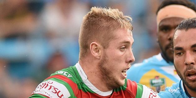 GOLD COAST, AUSTRALIA - MAY 30: Aaron Gray of the Rabbitohs takes on the defence during the round 12 NRL match between the Gold Coast Titans and the South Sydney Rabbitohs at Cbus Super Stadium on May 30, 2015 on the Gold Coast, Australia. (Photo by Matt Roberts/Getty Images)