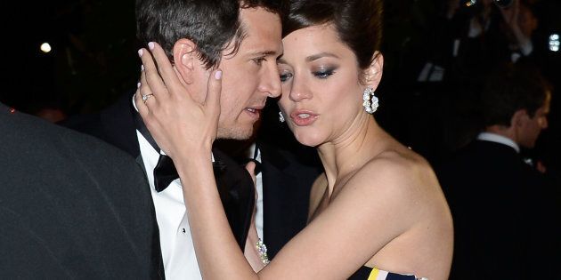 CANNES, FRANCE - MAY 20: Director Guillaume Canet (L) and actress Marion Cotillard attend the 'Blood Ties' Premiere during the 66th Annual Cannes Film Festival at Grand Theatre Lumiere on May 20, 2013 in Cannes, France. (Photo by Pascal Le Segretain/Getty Images)