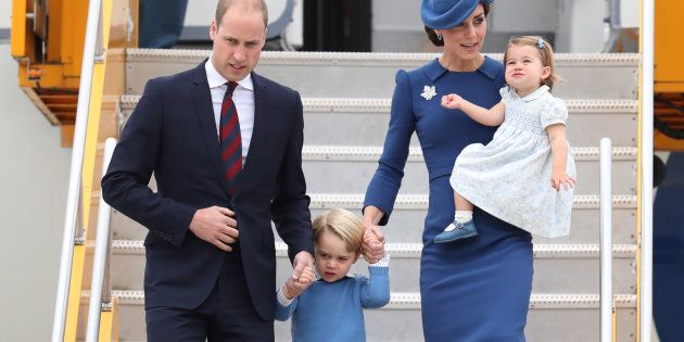Prince William, Duke of Cambridge, Catherine, Duchess of Cambridge, Prince George of Cambridge and Princess Charlotte of Cambridge arrive at the Victoria Airport on Sept. 24 in Victoria.