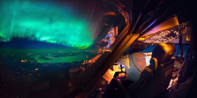 PIC BY CHRISTIAAN VAN HEIJST AND DAANS KRANS/CATERS NEWS - (PICTURED: An amazing view of the Northern Lights from the cockpit. ) - This is truly heavenly weather as pictures taken from an airplane cockpit reveal what pilots see from above. It looks like at cruising altitude the weather really hots up, with the flight deck revealing some amazing scenes. Thunderstorms light up the insides of clouds, lightening streaks across the sky like cracks in a windscreen, the northern lights sweep uninterrupted across the sky and the galaxy stretches on forever. The pictures were captured by senior first officer Christiaan van Heijst, a 33-year-old from the Netherlands, and his friend Daan Krans. SEE CATERS COPY.