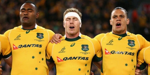 SYDNEY, AUSTRALIA - AUGUST 08: (L-R) Tevita Kuridrani, David Pocock and Matt Toomua of the Wallabies sing the Australian national anthem during The Rugby Championship match between the Australia Wallabies and the New Zealand All Blacks at ANZ Stadium on August 8, 2015 in Sydney, Australia. (Photo by Cameron Spencer/Getty Images)