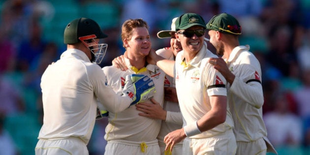 LONDON, ENGLAND - AUGUST 22: Australia bowler Steve Smith (2nd left) is congratulated after dismissing England batsman Alastair Cook for 85 runs during day three of the 5th Investec Ashes Test match between England and Australia at The Kia Oval on August 22, 2015 in London, United Kingdom. (Photo by Stu Forster/Getty Images)