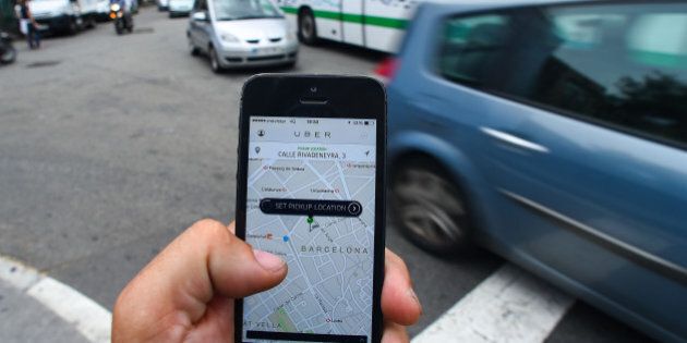 BARCELONA, SPAIN - JULY 01: In this photo illustration the new smart phone taxi app 'Uber' shows how to select a pick up location on July 1, 2014 in Barcelona, Spain. Taxi drivers in various cities have been on strike over unlicensed car-hailing services. Drivers say that there is a lack of regulation behind the new app. (Photo by David Ramos/Getty Images)