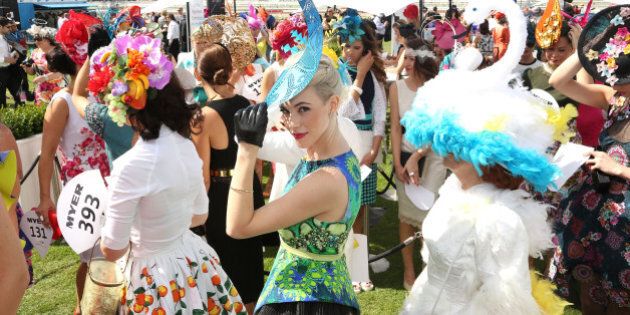 MELBOURNE, AUSTRALIA - NOVEMBER 04: Myer Fashions on the Field entrants line up in the Fashion on the Field enclosure on Melbourne Cup Day at Flemington Racecourse on November 4, 2014 in Melbourne, Australia. (Photo by Graham Denholm/Getty Images for the VRC)
