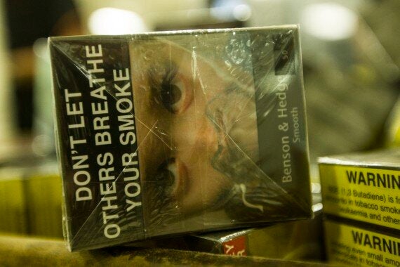 Tobacco companies challenge legality of UK plain packaging rules, Tobacco  industry