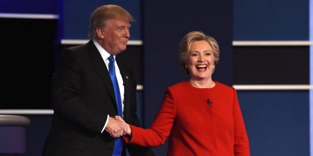 Democratic nominee Hillary Clinton (R) shakes hands with Republican nominee Donald Trump after the first presidential debate at Hofstra University in Hempstead, New York on September 26, 2016. / AFP / Timothy A. CLARY (Photo credit should read TIMOTHY A. CLARY/AFP/Getty Images)