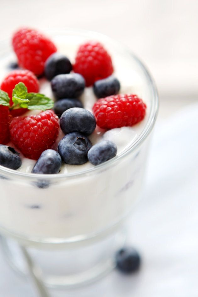 Flavour plain yoghurt with mashed berries and a touch of maple syrup.