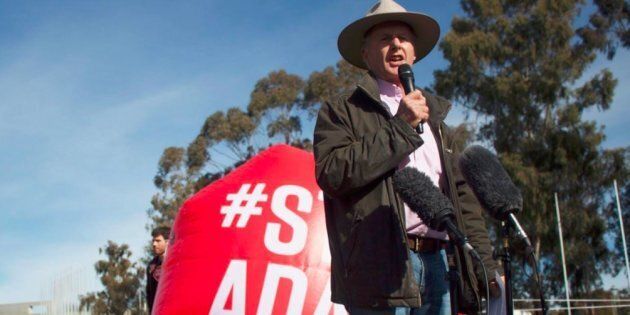 Sheep farmer, Charlie Prell speaks at the Stop Adani protest on the front lawns of Parliament House on Thursday.