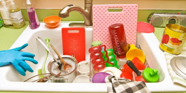 Sink filled with dirty dishes