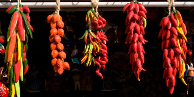 Close-up of strands of red chili peppers hanging,Olvera Street,Los Angeles,California,USA