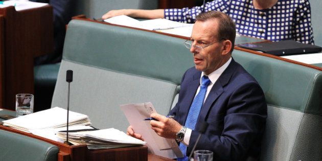 CANBERRA, AUSTRALIA - DECEMBER 03: Tony Abbott during House of Representatives question time at Parliament House on December 3, 2015 in Canberra, Australia. Mr Brough is being investigated by the Australian Federal Police any involvement in getting former staffer James Ashby to obtain copies of then-speaker Peter Slipper's diary in 2012. (Photo by Stefan Postles/Getty Images)