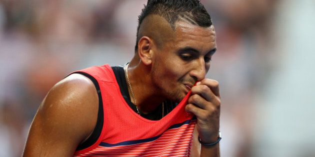 MELBOURNE, AUSTRALIA - JANUARY 20: Nick Kyrgios of Australia looks on in his second round match against Pabio Cuevas of Uruguay during day three of the 2016 Australian Open at Melbourne Park on January 20, 2016 in Melbourne, Australia. (Photo by Ryan Pierse/Getty Images)