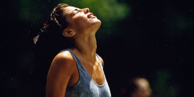 Exhausted runner drenched in sweat