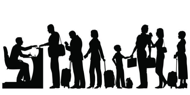 Editable vector silhouettes of a queue of people at an immigration desk with all figures and luggage as separate objects