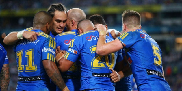 SYDNEY, AUSTRALIA - APRIL 29: Parramatta players celebrate a try by Vai Afu Toutai of the Eels during the round nine NRL match between the Parramatta Eels and the Canterbury Bulldogs at ANZ Stadium on April 29, 2016 in Sydney, Australia. (Photo by Mark Nolan/Getty Images)