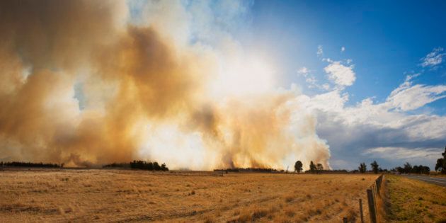 Bushfire in farmland, south of Launceston, Tasmania, Australia.