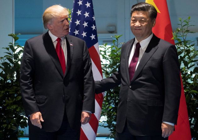 "he's a hard arse," said Kevin Rudd of Xi Jinping, who is pictured here with U.S. President Donald Trump on the sidelines of the G20 Summit in Hamburg, Germany, on July 8, 2017.