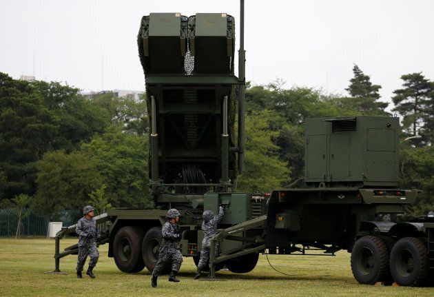 Japan Self-Defense Forces (JSDF) soldiers hold a drill to mobilise their Patriot Advanced Capability-3 (PAC-3) missile unit in response to recent missiles launch by North Korea, at JSDF Asaka base in Asaka, north of Tokyo, Japan, June 21, 2017. REUTERS/Issei Kato