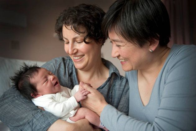 Senator Penny Wong and her partner Sophie Allouache with their baby daughter Alexandra in 2011. In Parliament last week, Wong delivered a blistering address condemning the "hatred" espoused by 'no' campaigners in the marriage equality debate.