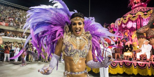 RIO DE JANEIRO, BRAZIL - FEBRUARY 08: Performers dances during Salgueiro performance at the Rio Carnival in Sambodromo on February 8, 2016 in Rio de Janeiro, Brazil. Despite the Zika virus epidemic, thousands of tourists gathered in Rio de Janeiro for the carnival. (Photo by Raphael Dias/Getty Images)