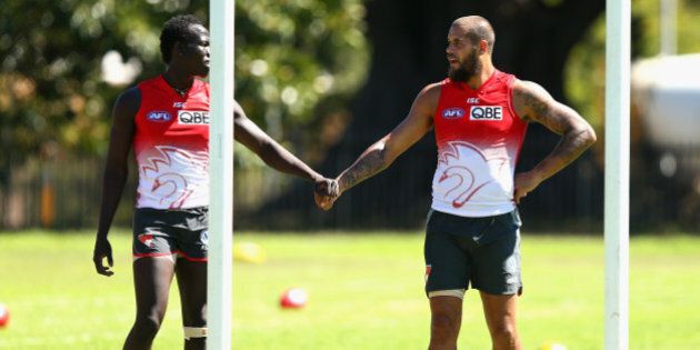 SYDNEY, AUSTRALIA - MARCH 11: Aliir Aliir and Lance Franklin of the Swans look on during a Sydney Swans AFL training session at Lakeside Oval on March 11, 2014 in Sydney, Australia. (Photo by Ryan Pierse/Getty Images)