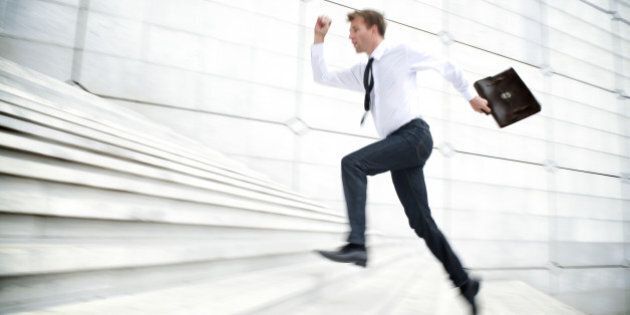 Motion Blur Office Worker Leaps Up White Staircase