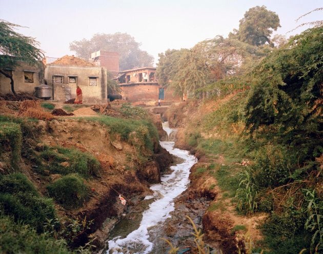 Water from the nearby sewage works, polluted with chemicals from tanneries, glue factories and poorly treated human waste, flows through Jana village on the banks of the Ganges