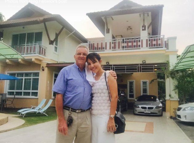 Andrew Fenwick, 66, and wife Somrudi Krailob Fenwick outside the family home in the Thai province of Rayong.
