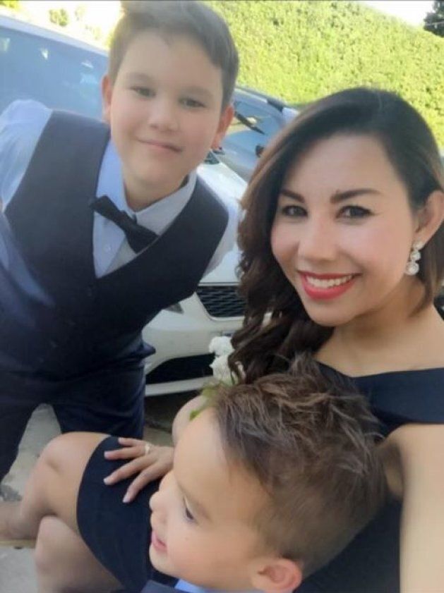 Mum Ning has paid tribute to her son Jason (back) and husband Andrew, who were both killed in the poolside tragedy. Jason's four-year-old brother Justin (front) alerted security guards to the double death.