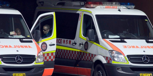 Ambulances are parked outside a hospital in Sydney, Australia, on Tuesday, May 4, 2010. The Australian budget will be presented on May 11. Photographer: Gillianne Tedder/Bloomberg via Getty Images