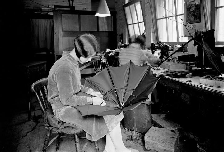 In 1934 this young woman worked at an umbrella manufacturer, sporting the Bob hairstyle that had been popular throughout the 1920s.