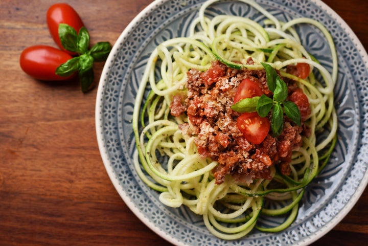 Try spiralising zucchini to make noodles, or finely chop mushrooms to hide into the sauce.