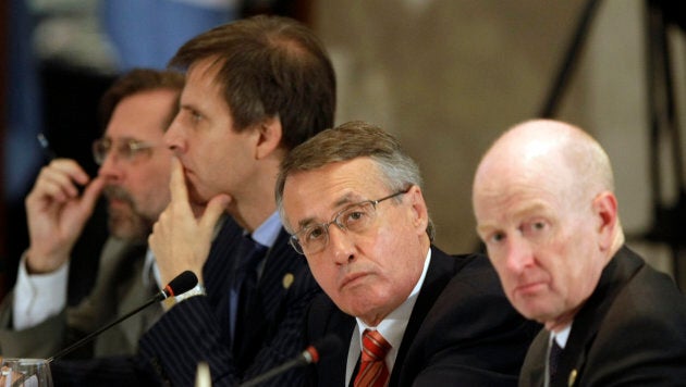 (R to L) Australia's central bank governor Glenn Stevens, Australia's Finance Minister Wayne Swan attend the opening ceremony of the G20 Finance Ministers and Central Bank Chiefs Meeting in Sao Paulo November 8, 2008. Finance ministers and central bank governors from the 20 most industrialised and important emerging economies are gathered at the meeting to discuss global financial stability.