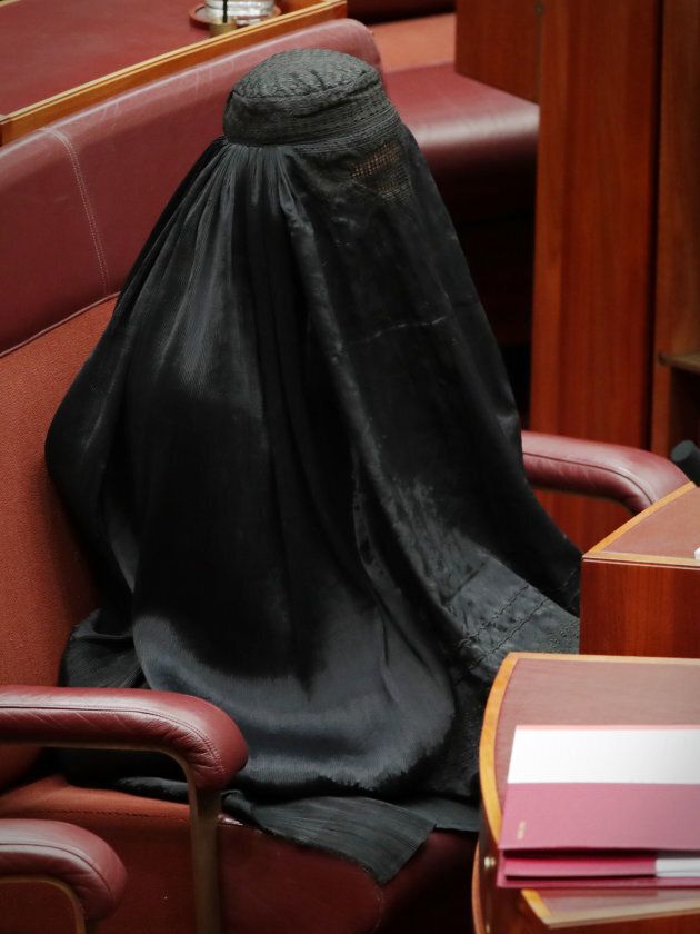 Senator Pauline Hanson wears a burqa during question time at Parliament House in Canberra on Thursday 17 August 2017.