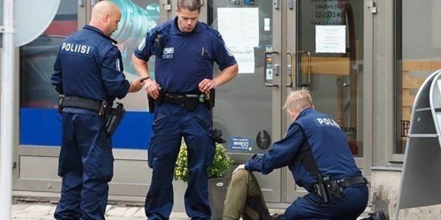 Police at the scene of a stabbing in Turku, Finland, on Friday. 