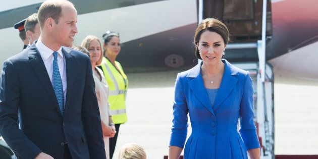 BERLIN, GERMANY - JULY 19: Prince William, Duke of Cambridge, Catherine, Duchess of Cambridge, Prince George of Cambridge and Princess Charlotte of Cambridge arrive at Berlin military airport during an official visit to Poland and Germany on July 19, 2017 in Berlin, Germany. (Photo by Samir Hussein/WireImage)