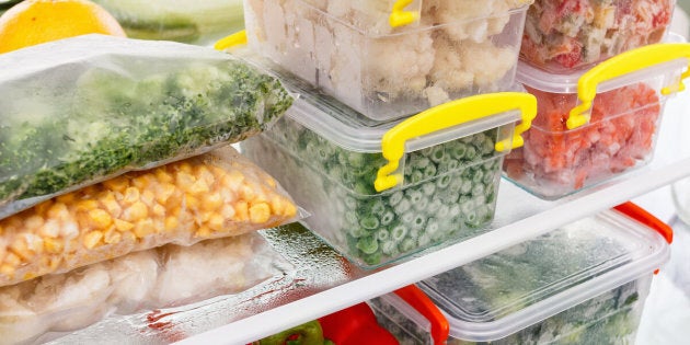 Frozen food in the refrigerator. Vegetables on the freezer shelves. Stocks of meal for the winter.