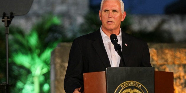 US Vice President Mike Pence speaks during a joint press conference with Colombian President Juan Manuel Santos (not in frame) at the Presidential guest house in Cartagena, Colombia on August 13, 2017. Pence launches a Latin America tour that has taken on new significance following President Donald Trump's threat of a possible 'military option' against Venezuela. The weeklong trip, aimed at coordinating a regional diplomatic action to the political crisis in Caracas, begins in Colombia and also includes Argentina, Chile and Panama. / AFP PHOTO / STR (Photo credit should read STR/AFP/Getty Images)