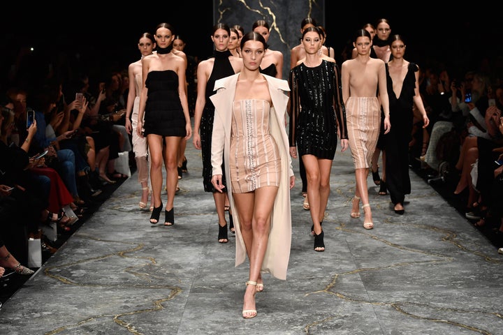 SYDNEY, AUSTRALIA - MAY 16: Model Bella Hadid leads models as they walk the runway during the Misha Collection show at Mercedes-Benz Fashion Week Resort 17 Collections at Carriageworks on May 16, 2016 in Sydney, Australia. (Photo by Stefan Gosatti/Getty Images)