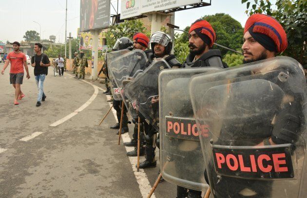 Police anticipated violence and prepared for a confrontation with devotees.