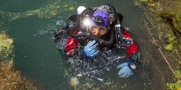 Krzysztof Starnawski returns to the surface after an hourslong dive in Hranicka Propast a cave in the Czech Republic
