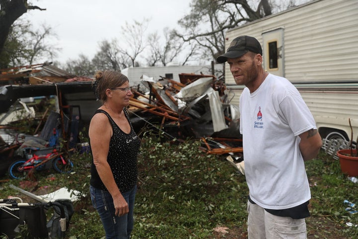 Residents stand where their homes used to be after Hurricane Harvey.